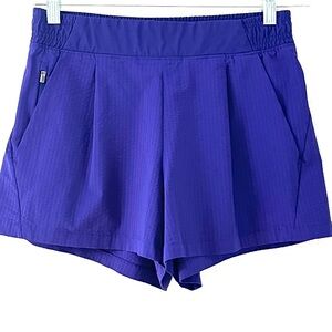LIKE NEW Athleta Four Way Stretch Purple Shorts